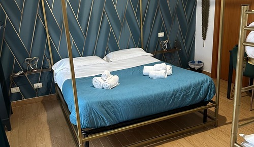 Deluxe Quadruple Room, Balcony, Partial Sea View