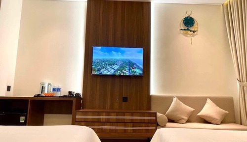 Deluxe Quadruple Room, 2 Queen Beds, Balcony, Beach View
