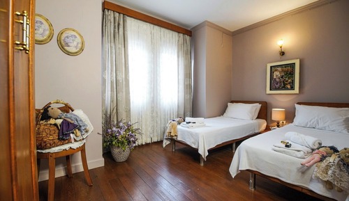 Deluxe Quadruple Room, City View