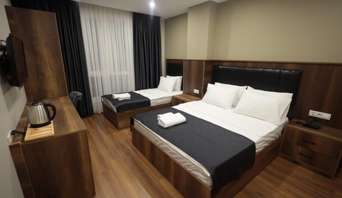 Deluxe Triple Room, City View