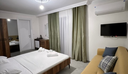 Deluxe Quadruple Room, Balcony, Garden View