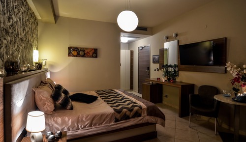 Deluxe Triple Room, Partial Sea View