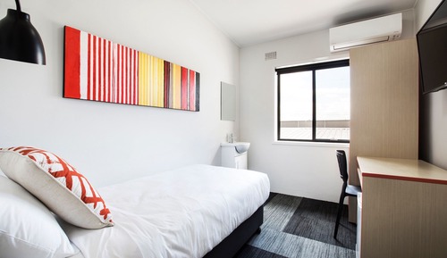 Single room with shared bathroom