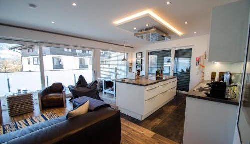 Three-Bedroom Apartment with Balcony and Lake View