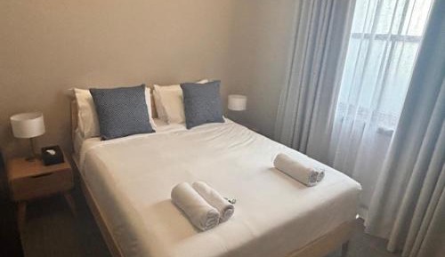 Queen Room Shared Bathroom