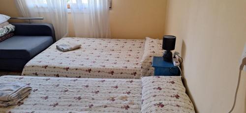 Basic Triple Room with Shared Bathroom