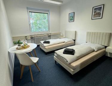 Double or Twin Room with Shared Bathroom