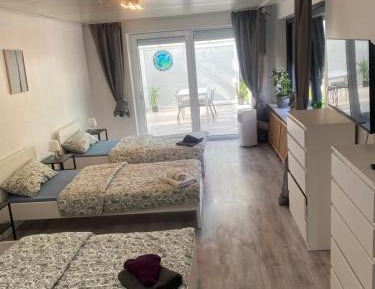 Quadruple Room with Shared Bathroom
