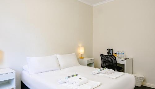 Queen Room with Shared Bathroom