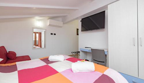 One-Bedroom Apartment with Balcony and City View
