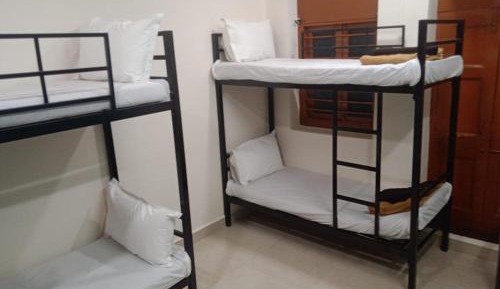 Single Bed in Dormitory Room