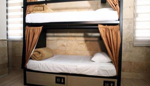 Single Bed in Female Dormitory Room