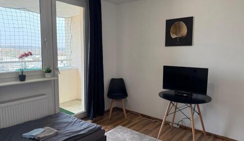 Three-Bedroom Apartment with Balcony