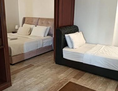 One-Bedroom Apartment with Balcony and City View