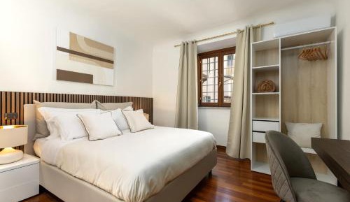One-Bedroom Apartment with Balcony and City View