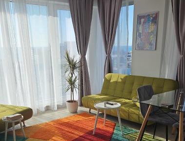 One-Bedroom Apartment with Balcony and Water View