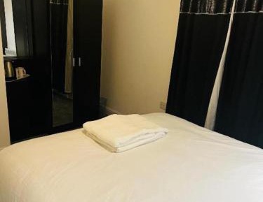 Standard Double Room with Shared Bathroom