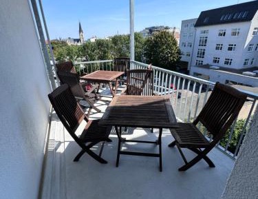 Four-Bedroom Apartment with Balcony 