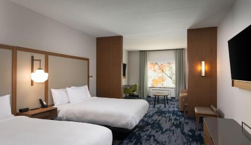 Extended Queen Suite with Two Queen Beds and Sofa Bed