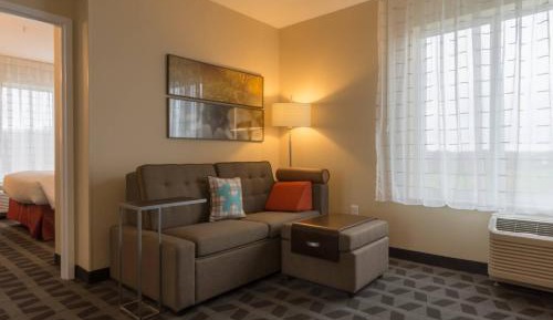 One Bedroom Suite with queen bed, sofa bed and city view