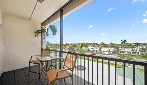 Deluxe King with Balcony, Kitchenette and Sofa Bed