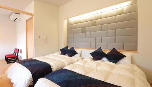 Quadruple Room with Private Bathroom