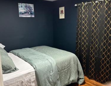 Queen Room with Shared Bathroom