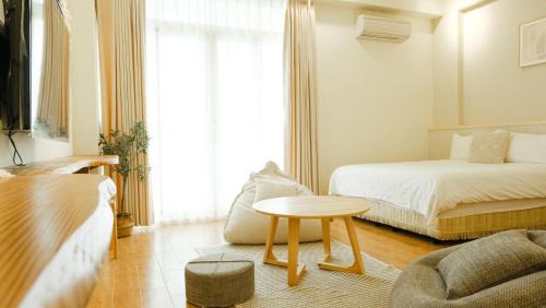 Deluxe Quadruple Room with Balcony