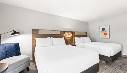 Standard Queen Room with Two Queen Beds and Bath Shower Combo