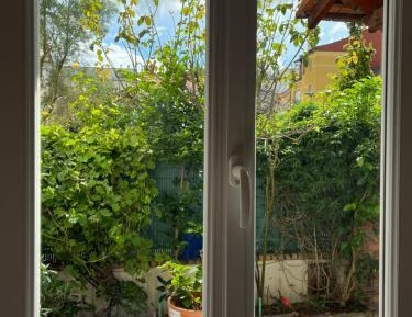 One-Bedroom Apartment with Garden View