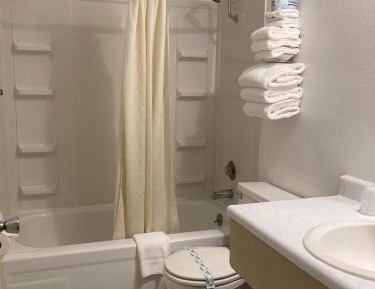 Efficiency Room with One King Bed and One Queen Bed, Non-Smoking