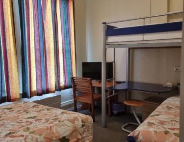 Quadruple Room with Shared Bathroom