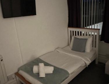 Family room with 1 double and 1 single bed