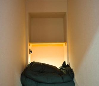 Single Bed in Dormitory Room