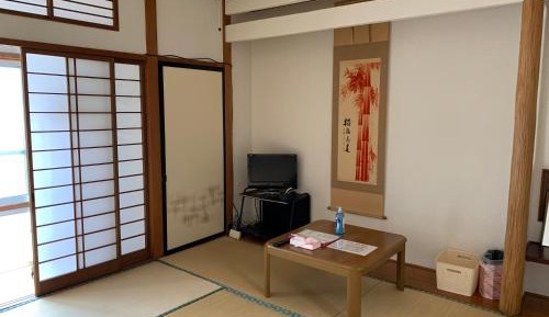 Quadruple Room with Shared Bathroom