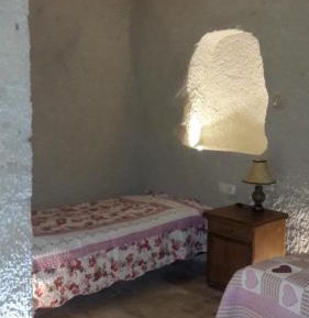 Standard Quadruple Cave Room (No Window)