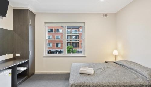 Queen Room with Shared Bathroom