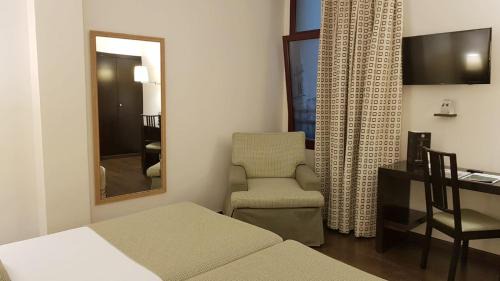 Twin Room (2 Adults + 1 Child)