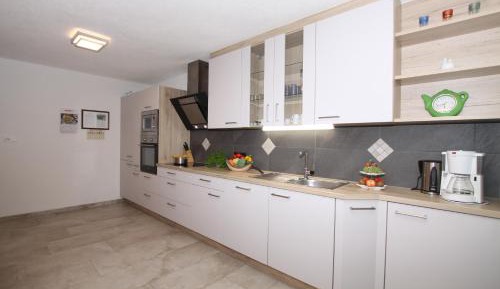 Three-Bedroom Apartment with Balcony and Terrace