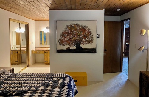 Lake Cavanaugh Cabin | Charming Waterfront Mid Century Waterfront Cabin w/ Hot Tub + Breathtaking Views