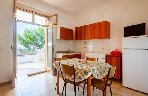 Mattinata Apartment | Enjoy a magnificent view of the sea from this vacation apartment.