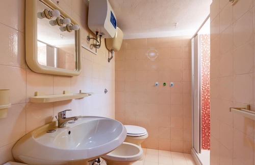 Mattinata Apartment | Enjoy a magnificent view of the sea from this vacation apartment.