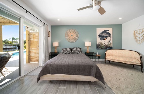 Tropic Palms House | Beautiful Oasis on Canal, Minutes from the Beach!