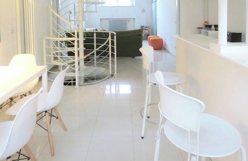 Barriera di Milano Apartment | Very bright open space apartment with entire glass wall