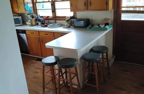 Long Beach Apartment | Scenic 3-bedroom apartment with WiFi, AC on Davis Canal in Oak Island.