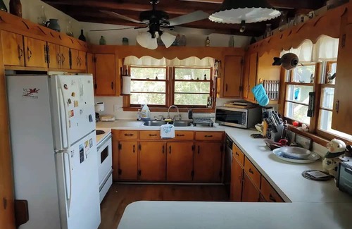 Long Beach Apartment | Scenic 3-bedroom apartment with WiFi, AC on Davis Canal in Oak Island.