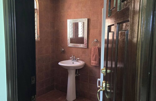 Zona 13 House | Charming bedroom at 3 minutes from the Guatemala city airport.