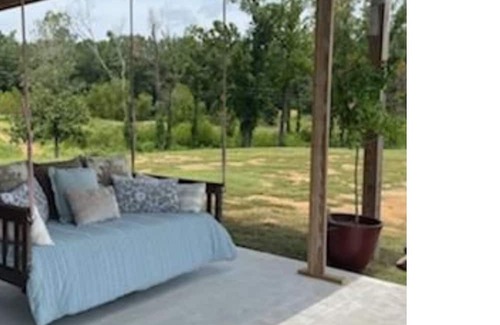 Negreet House | RV Cover with entertaining patio and additional storage area at Toledo Bend Lake