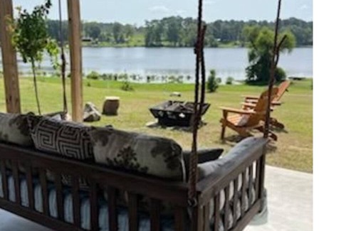 Negreet House | RV Cover with entertaining patio and additional storage area at Toledo Bend Lake