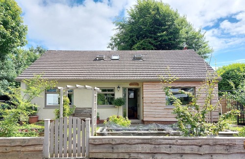 Bishopston House | Elegant king-size ensuite bedroom & private garden. Gower coastal accommodation.